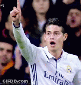 Soccer Player In Fly Emirates Jersey Raises Fist GIF