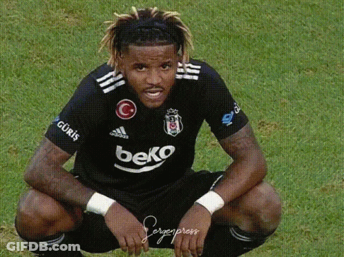 Soccer Player In Fly Emirates Jersey Shakes Hands GIF