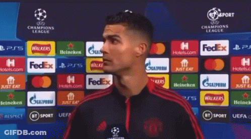 Soccer Player In Front Of Champions League Banner GIF