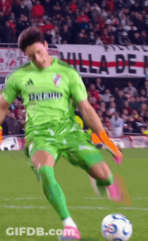 Soccer Player In Green Adidas Jersey Kicking Ball GIF