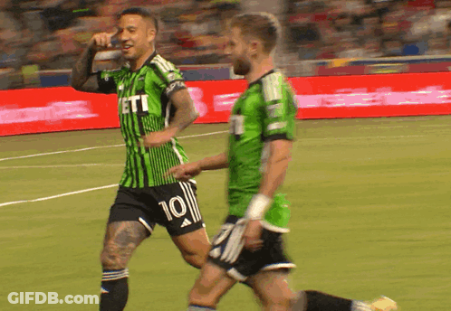 Soccer Player In Green And Black Jersey Number 10 GIF