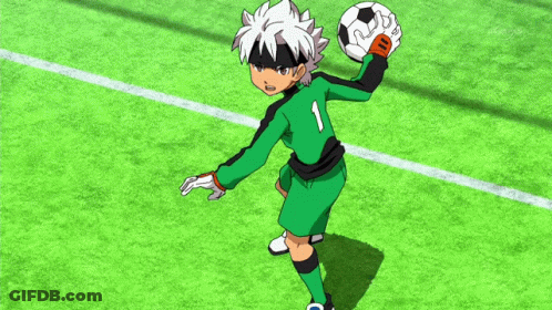 Soccer Player In Green And Black Uniform Holding Ball GIF