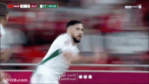 Soccer Player In Green And White Uniform Running GIF