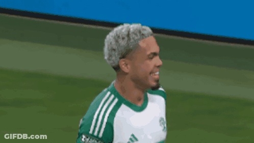Soccer Player In Green And White Yeti Jersey GIF