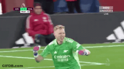 Soccer Player In Green Emirates Jersey Celebrates Goal GIF