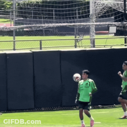 Soccer Player In Green Jersey 21 Kicking Ball GIF