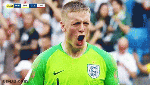 Soccer Player In Green Jersey Celebrating Goal GIF