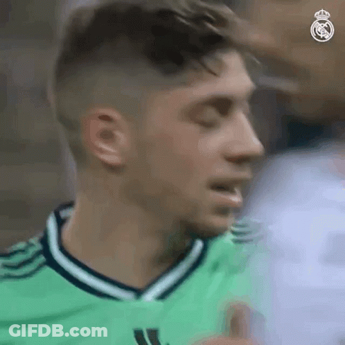 Soccer Player In Green Jersey Giving Thumbs Up GIF