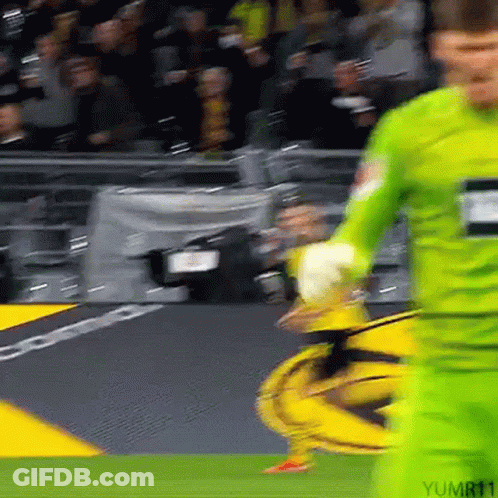 Soccer Player In Green Jersey Kicking Ball GIF