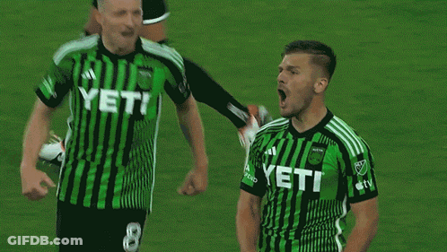 Soccer Player In Green Jersey Number 14 GIF