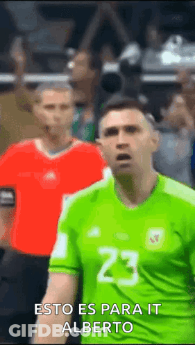 Soccer Player In Green Jersey Number 23 In Front Of Crowd GIF