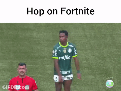 Soccer Player In Green Jersey With Referee GIF