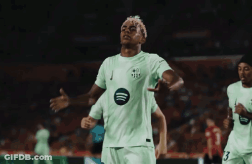 Soccer Player In Green Jersey With Spotify GIF