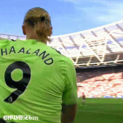 Soccer Player In Green Shirt Number 9 GIF