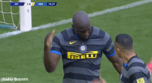 Soccer Player In Irelli Jersey Arm Around Another Player GIF