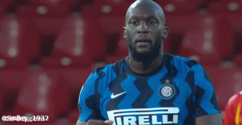 Soccer Player In Irelli Jersey Covering Face GIF