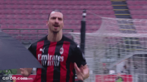Soccer Player In Jersey Saying Emirates Fly Better GIF