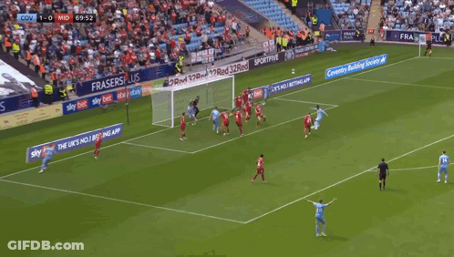 Soccer Player In Light Blue Jersey Celebrating With Teammates GIF