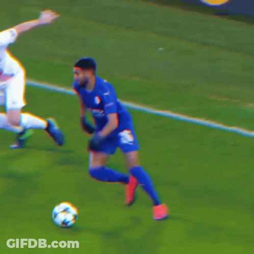 Soccer Player In Light Blue Shirt And Black Gloves GIF