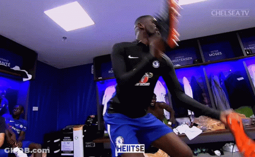 Soccer Player In Locker Room With Chelsea TV Logo GIF