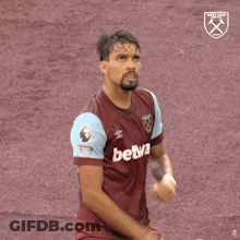 Soccer Player In Maroon Jersey Number 10 GIF