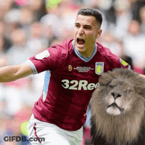 Soccer Player In Maroon Jersey With 32Re GIF