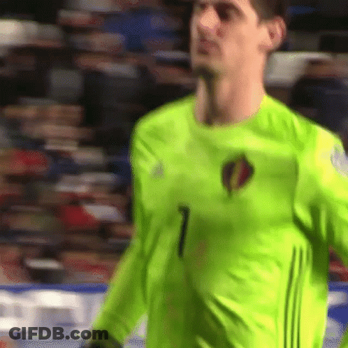 Soccer Player In Neon Green Jersey Number 1 GIF