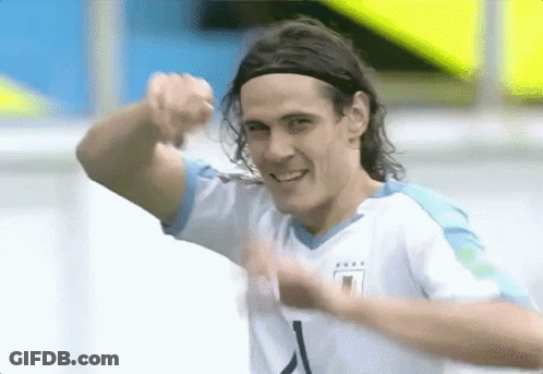 Soccer Player In Number 1 Jersey Smiling Pointing GIF