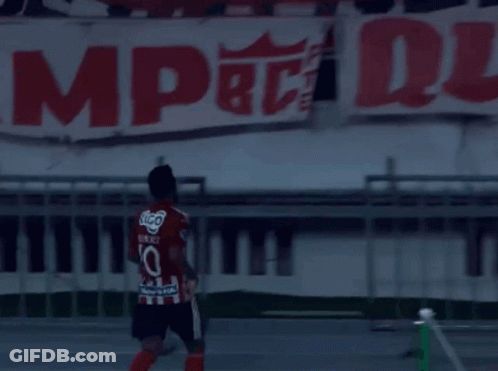 Soccer Player In Number 10 Jersey In Front Of Banner GIF
