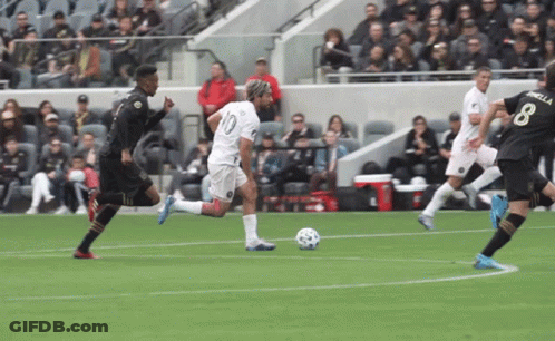 Soccer Player In Number 10 Jersey Kicking Ball GIF