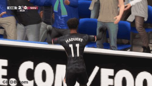 Soccer Player In Number 11 Jersey In Front Of Crowd GIF