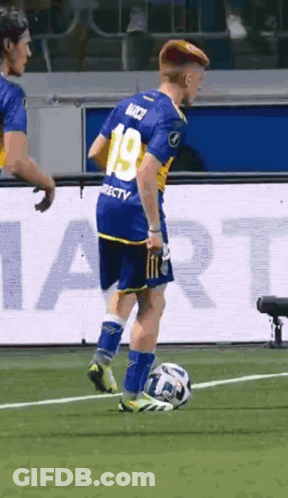 Soccer Player In Number 19 Jersey Kicking Ball GIF