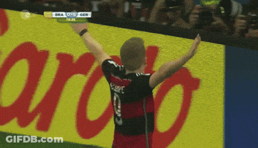 Soccer Player In Number 9 Jersey Pointing To Crowd GIF
