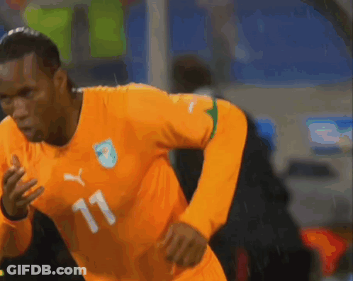 Soccer Player In Orange Jersey Number 11 GIF