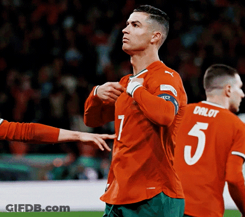 Soccer Player In Orange Jersey Number 5 GIF