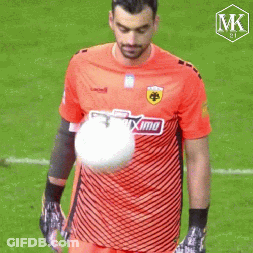Soccer Player In Orange Maxima Shirt GIF