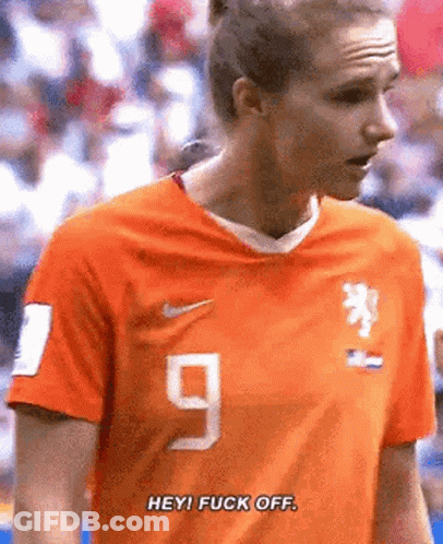 Soccer Player In Orange Shirt Number 9 GIF