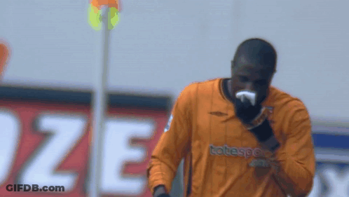 Soccer Player In Orange Totesport Jersey GIF