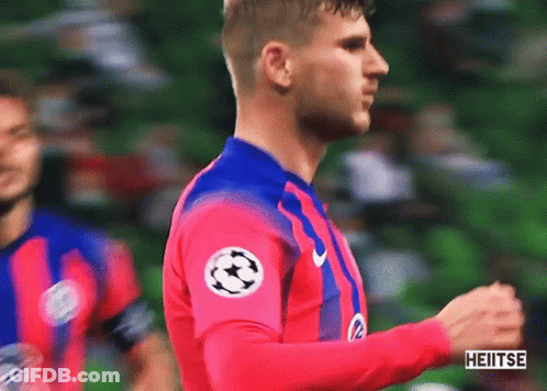 Soccer Player In Pink And Blue Jersey With Soccer Ball GIF