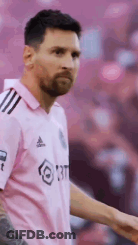 Soccer Player In Pink Jersey On Field GIF