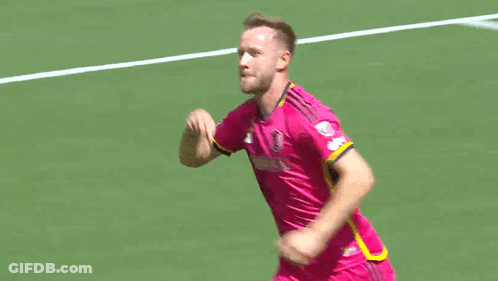 Soccer Player In Pink Purina Jersey Running GIF