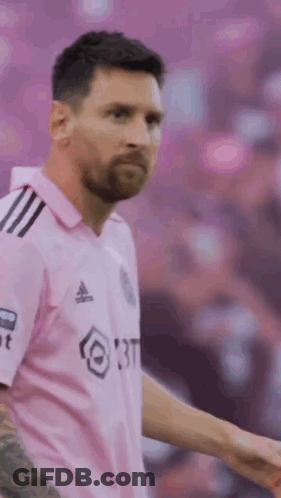 Soccer Player In Pink Shaking Hands GIF