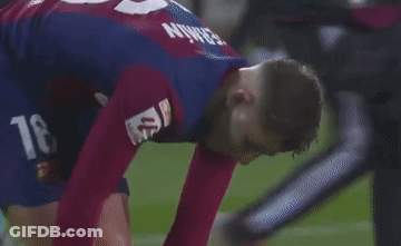 Soccer Player In Purple And Blue Jersey Kneeling GIF