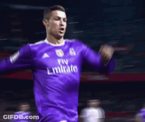 Soccer Player In Purple Emirates Jersey Celebrating Goal GIF
