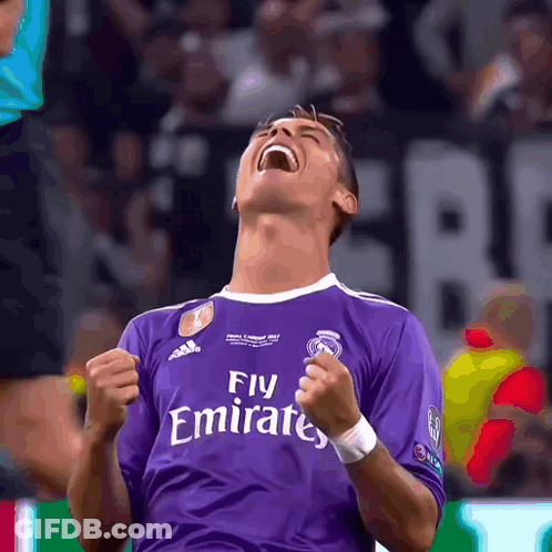 Soccer Player In Purple Fly Emirates Shirt Celebrates GIF