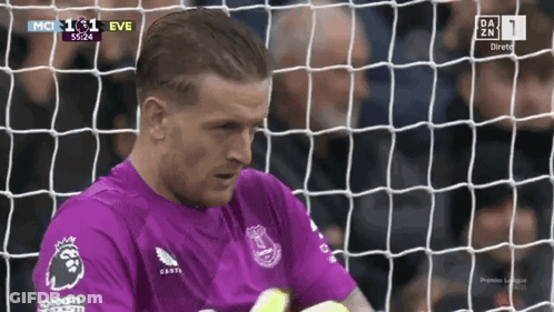 Soccer Player In Purple Jersey At Net GIF