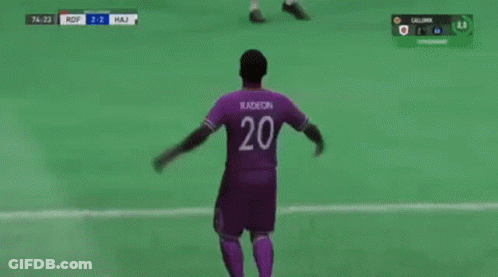 Soccer Player In Purple Jersey Celebrating Goal GIF