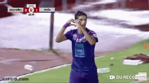 Soccer Player In Purple Shirt Celebrating Goal GIF
