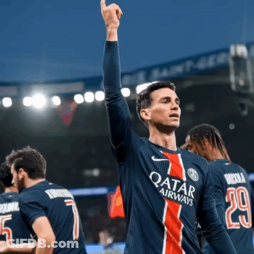 Soccer Player In Qatar Airways Jersey Kicks Ball GIF
