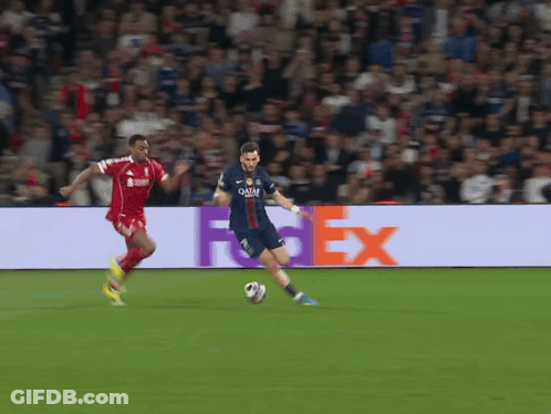 Soccer Player In Qatar Jersey Kicks Ball GIF